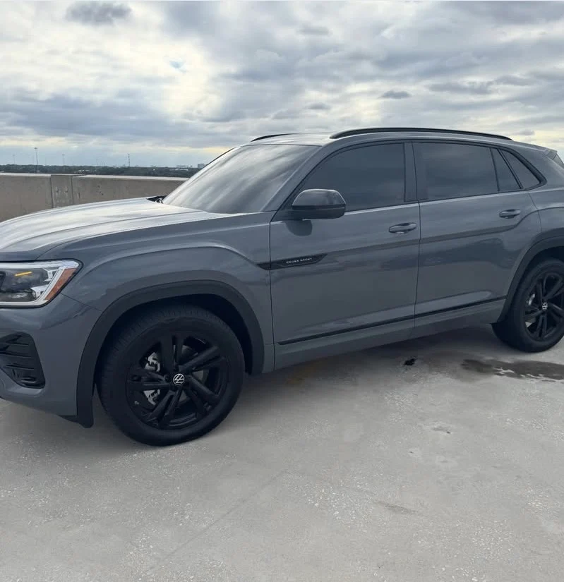 Volkswagen Atlas Cross Sport (Gray) exterior — premium car rental in Tampa Bay