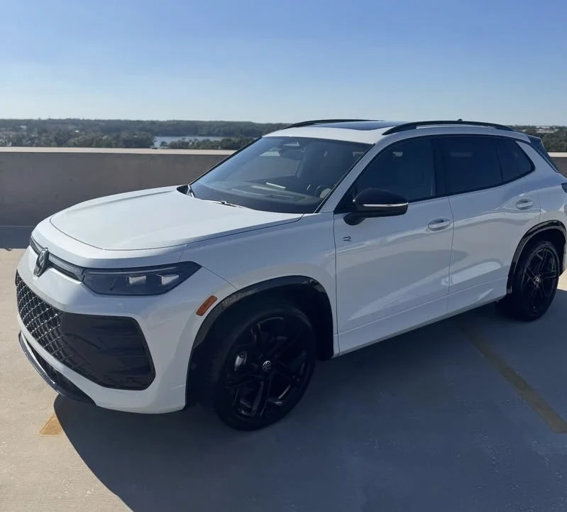 Volkswagen Atlas Cross Sport (White) exterior — premium car rental in Tampa Bay